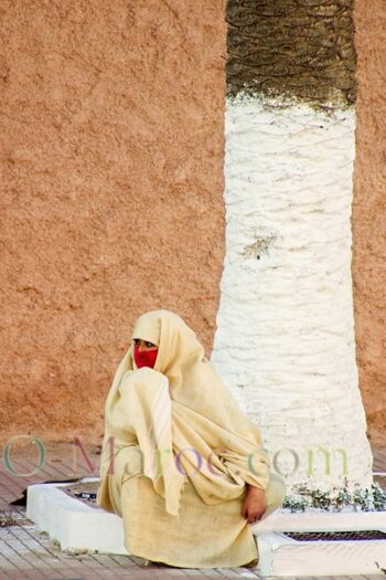 Woman in white haïk and red headscarf, Essaouira