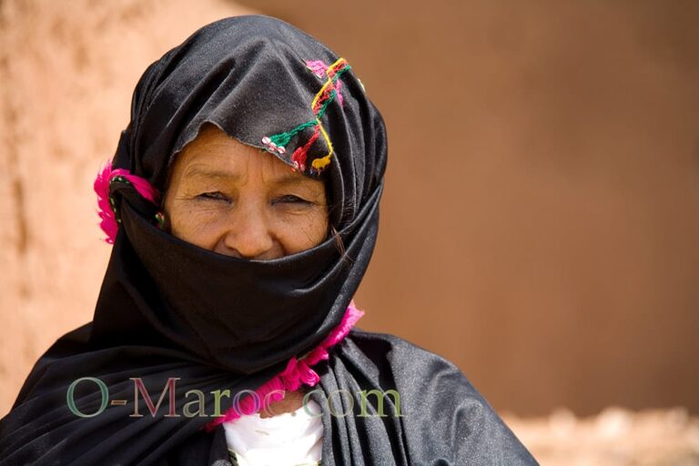 Old Berber woman from the Draa Valley with her black embroidered shawl