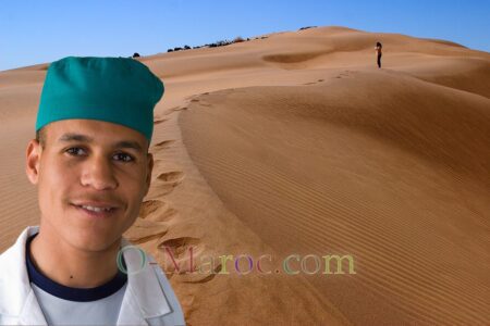 Portrait of a nurse in front of the Merzouga dunes