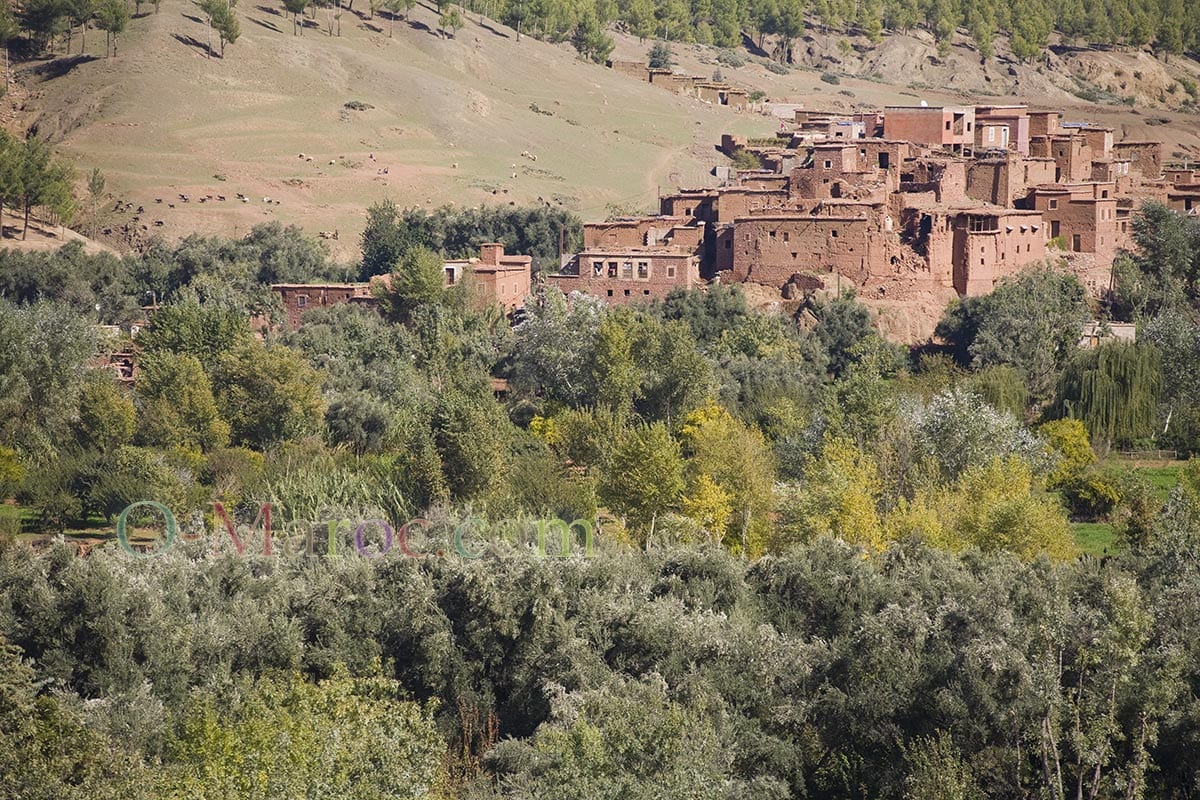 Berber village of mud houses clinging to the mountainside between Marrakech and Ouarzazate