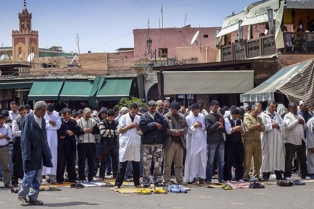 Friday prayers in the street in Marrakesh