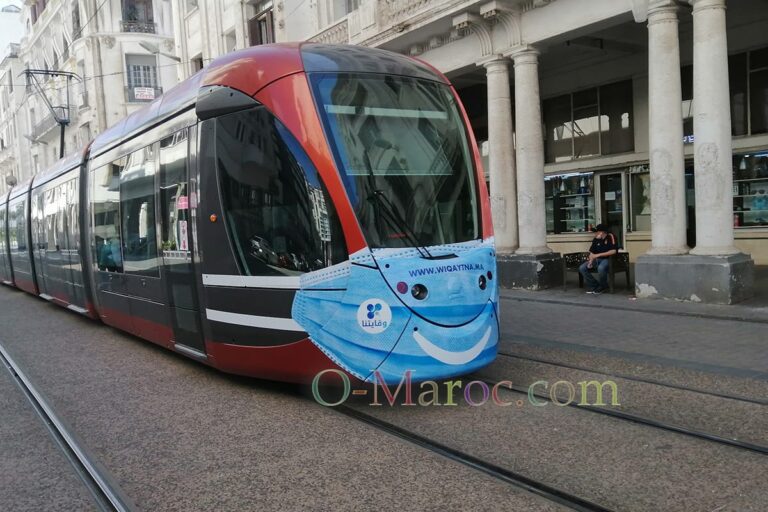 Tram displaying an advertisement in the shape of a mask