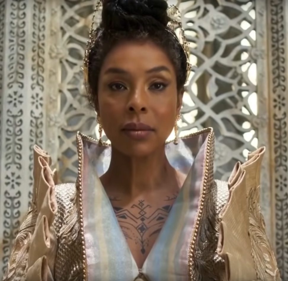 Siuan Sanche, the Chair of Amyrlin, with her Berber tattoo on her chest
