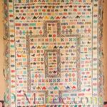 Berber wedding rug, on a light background, hanging on a wall