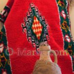 Tazzarine rug and earthenware jar