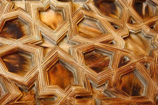 Wooden door with polygon pattern