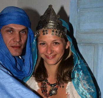 Marc Lavoine in Saharaoui, Sarah Lavoine in traditional blue costume