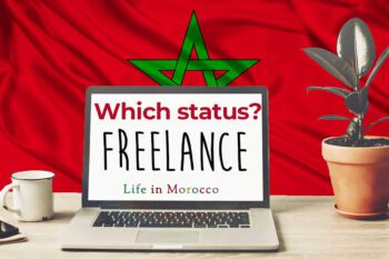 A PC with a cup and a green plant on a Moroccan flag background with the question "Which freelance status?