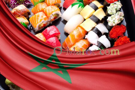 A tray of sushi under a Moroccan flag