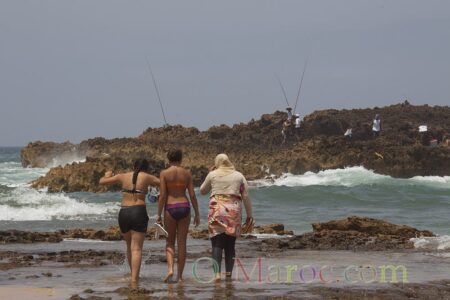 Three young girls on the beach in Oualidia